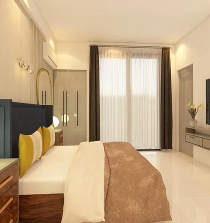 This angle shows the TV unit and the overall layout of the spacious bedroom design.