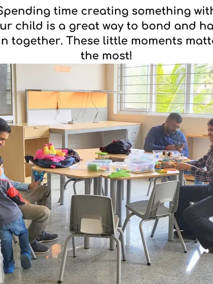 A family sits together at a table, deeply engaged in a creative activity. These moments of shared focus and fun are where the strongest bonds are built, and they are at the core of my parent-child workshops.