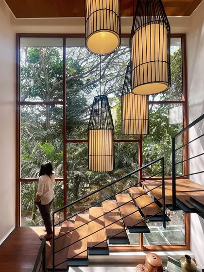 We believe staircases can be more than just functional. In our "Home by the Park" renovation, we designed this floating staircase to feel like an ascent through the tree canopy, creating a moment of connection with nature.