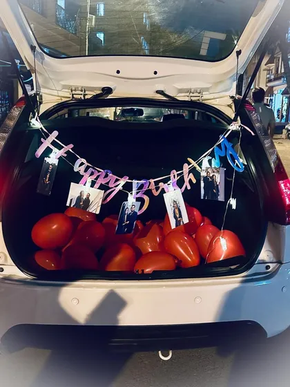 For a surprise that's completely unexpected, we offer our signature car boot decoration. We fill the trunk with balloons, hang a "Happy Birthday" banner, and string up your favorite photos for a reveal that delivers a huge wow factor on the go.