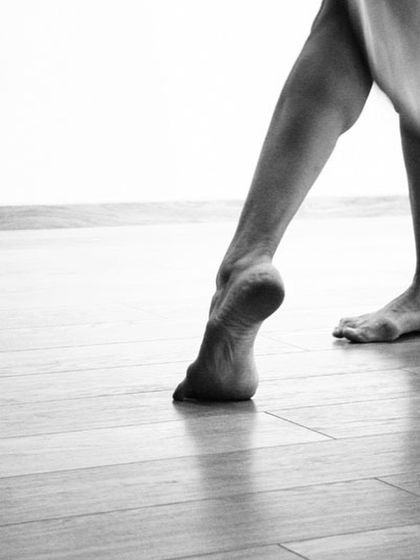 A close-up of a dancer's feet. This simple, elegant shot, paired with a poetic quote, speaks volumes about the foundation of my art.