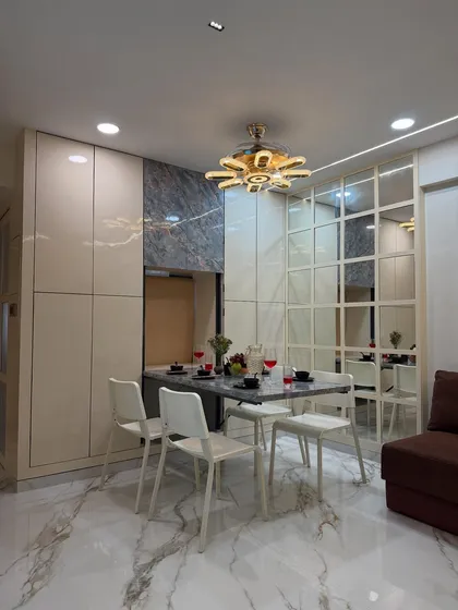 Another angle of the living and dining space, showing the proximity of the dining area to the sofa, illustrating how my designs work in practical, everyday layouts.