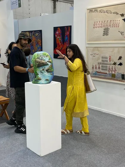 Shenaz Treasurywala and Ashmit Patel discussing a sculpture by Venkat Bothsa at our Art Mumbai booth.