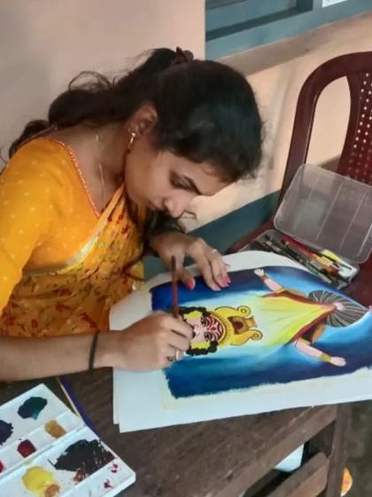 A duplicate image of me focused on my painting during the competition. Art is a continuous learning process, and I am grateful for all my supporters.