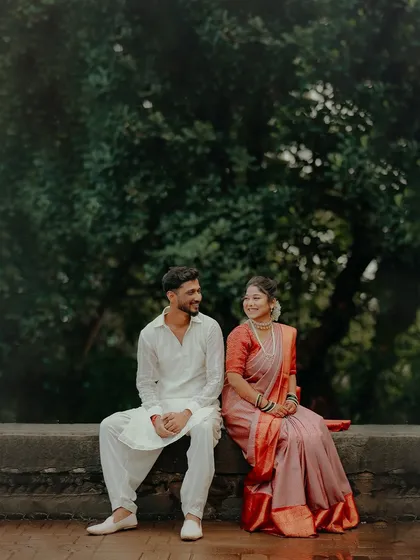 A quiet moment of conversation between the newly engaged couple. This candid shot captures their easy comfort and happiness with each other.