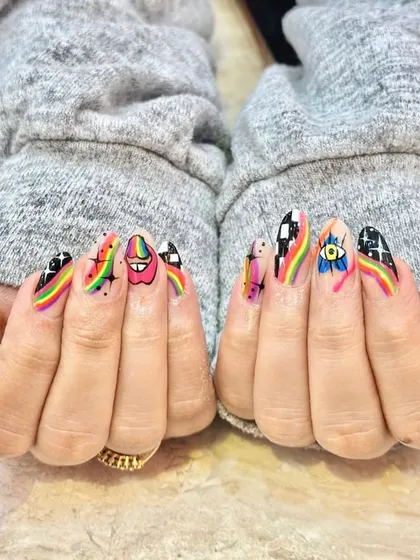When you can't decide on one vibe, why not have them all? This set features a mix of hand-painted designs, including rainbows, checkerboard patterns, an evil eye, and watermelon slices for a truly unique look.