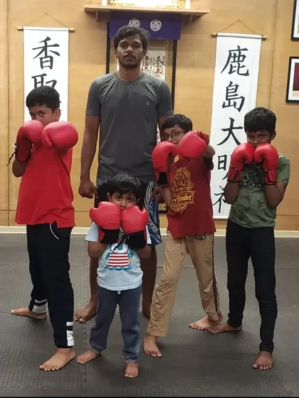Ready for action. This group has been working on their basic boxing punches and are showing great improvement in their form and power.
