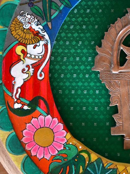 A detailed shot of the Buddha frame, focusing on the beautifully rendered mythical mount. This piece blends traditional iconography with my artistic interpretation, all within a restored vintage clock frame.