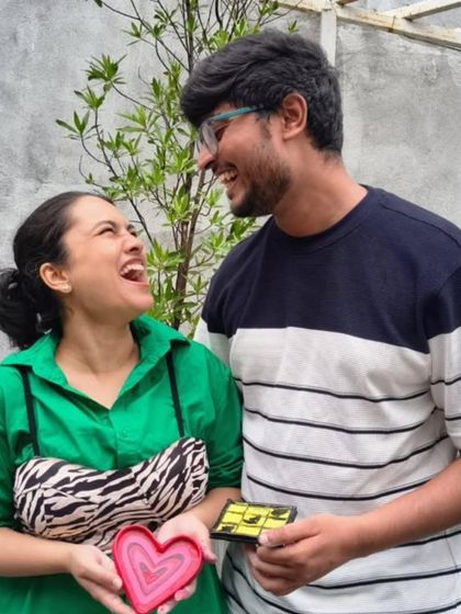 A candid moment of laughter and connection between two attendees. This is what happens when you put the phone down and meet someone new.