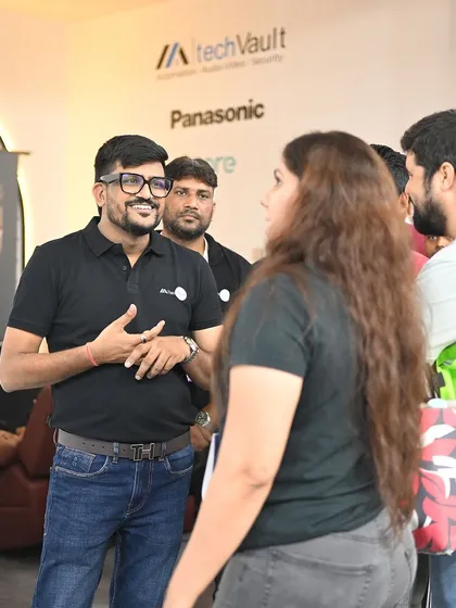Our director engaging with a group of visitors at our booth. These interactions are invaluable for sharing our expertise and learning from others in the industry.