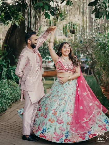 Amid a cascade of fairy lights and pastel dreams, this beautiful couple twirls into their new life together. We planned their Haldi ceremony to be a perfect picture of love, with a vibrant lehenga, an intricate sherwani, and laughter that lit up the entire garden venue.