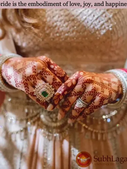 A bride's hands, decorated with beautiful henna and rings, are a symbol of love, joy, and happiness. We celebrate the beauty of these traditions.