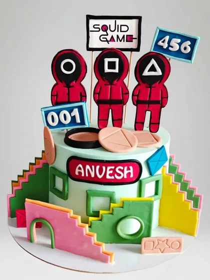 Another take on the Squid Game theme, this cake features the memorable colorful staircase from the show. The design is complex and captures the unique aesthetic of the series.