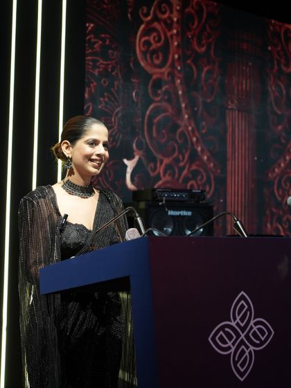 At the podium before the Encalm annual event. A moment of calm before the energy of the show begins.