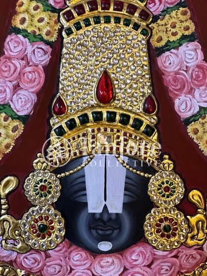 This close-up of a Lord Balaji painting captures his divine presence. The use of gold foils and gems portrays the richness associated with the deity, bridging the gap between the artist and the divine.