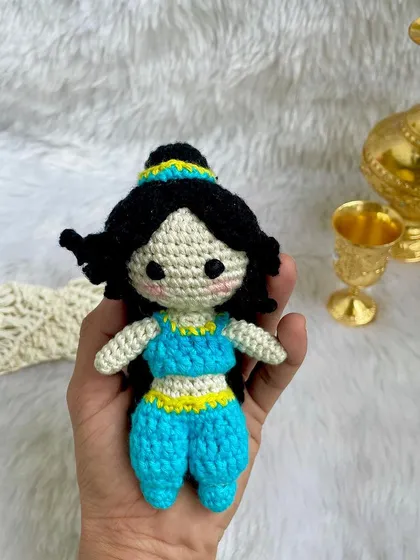 Princess Jasmine from Aladdin. I loved creating her iconic blue outfit and hairstyle. She is ready for a magic carpet ride and makes a wonderful addition to the Disney princess collection.