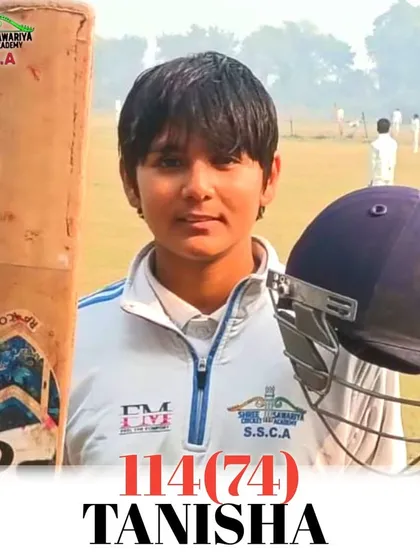 Tanisha with her bat and helmet after scoring another brilliant century. She is a role model for all the young girls at our academy.