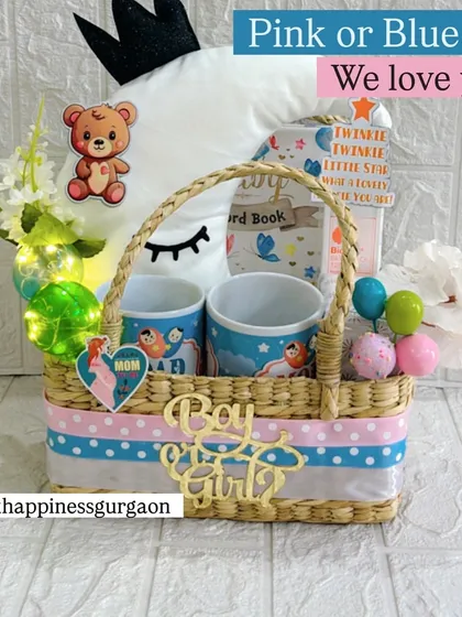 "Pink or Blue, We love you!" This hamper celebrates the anticipation with a mix of pink and blue ribbons, parent mugs, and a baby record book.