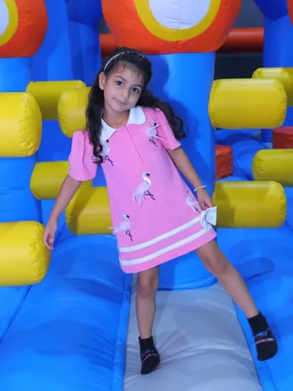 A young princess takes on one of our inflatable obstacle courses. It's proof that you can be dressed for a royal ball and still have an adventure.