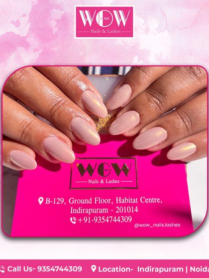 Simple, clean, and elegant. This manicure features a beautiful nude pink polish on perfectly shaped almond nails, proving that sometimes less is more.