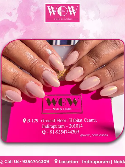 Simple, clean, and elegant. This manicure features a beautiful nude pink polish on perfectly shaped almond nails, proving that sometimes less is more.