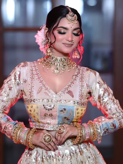 The full look, showing how the pastel colors of the outfit are balanced with soft, neutral makeup.