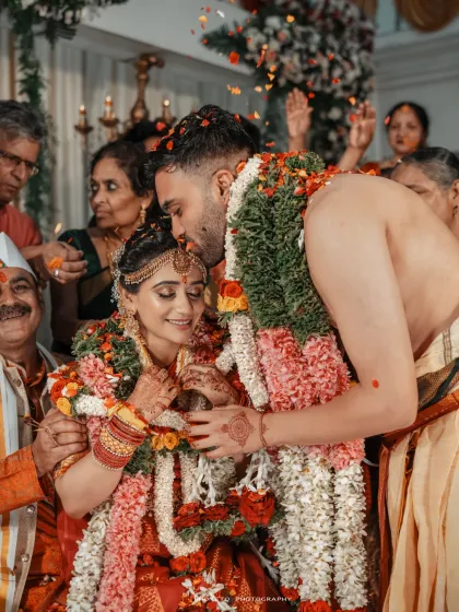 The air filled with love, laughter, and a shower of petals. We immerse ourselves in the celebration to capture the peak emotions and vibrant energy of your sacred Hindu wedding rituals.