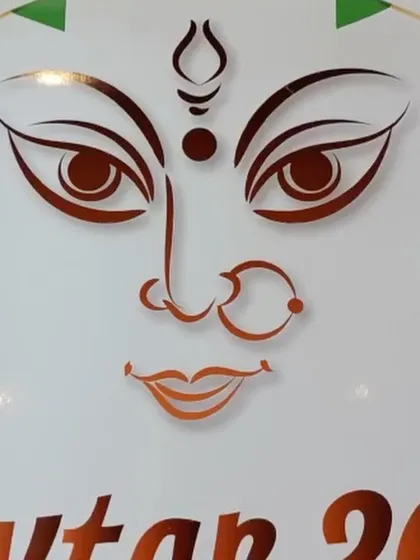 A minimalist digital illustration of Ma Durga's face, which I designed for a Navratri program poster. This clean, vector-style art is perfect for logos, branding, and event materials.