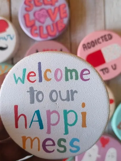"Welcome to our happi-mess." This colorful, hand-lettered magnet is a fun and honest celebration of a happy, chaotic home.