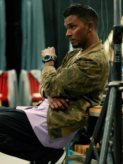 In my zone as a mentor. Observing, listening, and learning from my students is just as important as teaching them. This is me during a rehearsal, taking it all in.