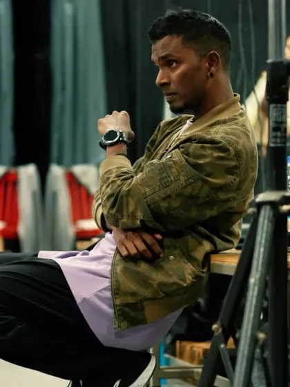 In my zone as a mentor. Observing, listening, and learning from my students is just as important as teaching them. This is me during a rehearsal, taking it all in.