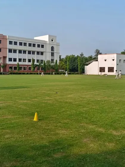 A view of our professional-grade ground during a junior team match. Our residential campus in Noida has everything you need to live and breathe cricket.
