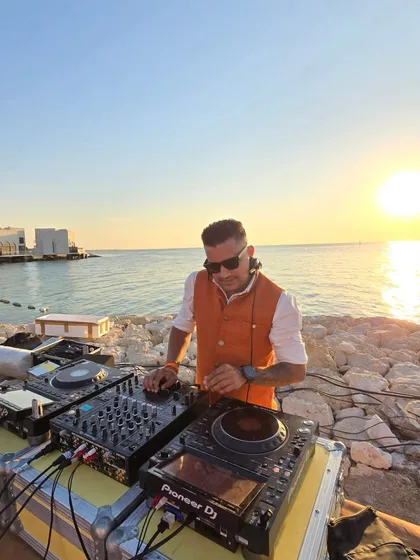 Setting the vibe for a destination wedding in Bahrain. A sunset performance by the water is perfect for a sundowner or welcome party, and I specialize in curating the music to match these unforgettable moments.