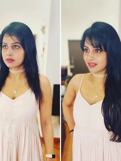 The smile says it all. This client is glowing with her new, longer hair.