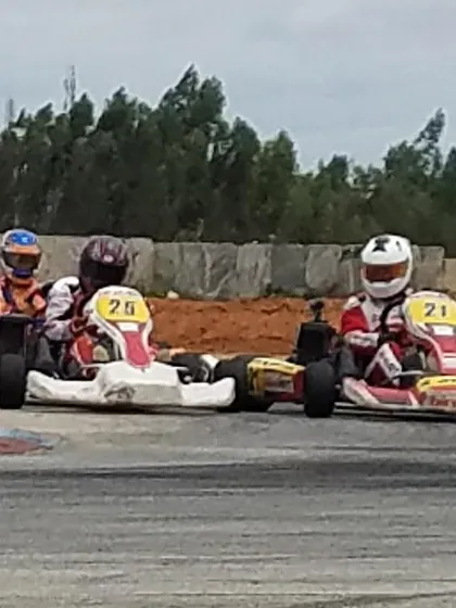 A close-up of the on-track battle, with our drivers executing precise maneuvers to maintain their dominant positions.