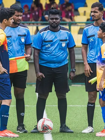 The pre-match coin toss with the captains and referees for a U15 Thane Youth League fixture.