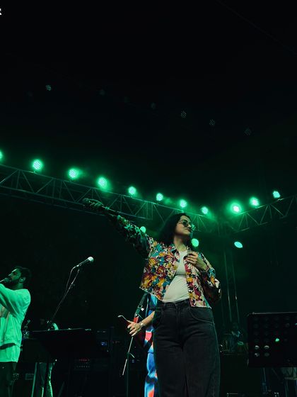 Reaching out to the crowd during a performance. I always make it a point to engage with the audience and make them feel included in the experience.