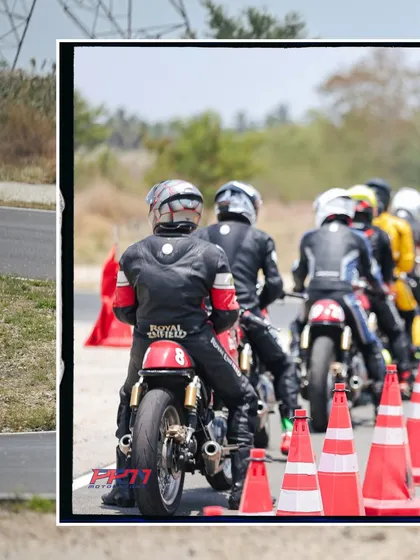 A group of riders follows a coach during a line-following drill. This exercise is crucial for learning the optimal racing line and understanding how to navigate the track efficiently.