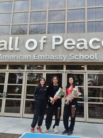 The Moving Souls team outside the American Embassy School. We love sharing the joy of dance with different communities.