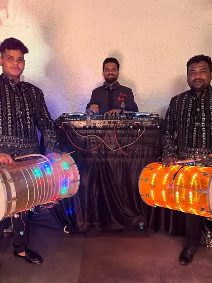 For a truly authentic desi wedding or sangeet, I collaborate with live dhol players. This fusion of my DJ set with live dhol beats creates an electrifying atmosphere for the baraat or dance floor.