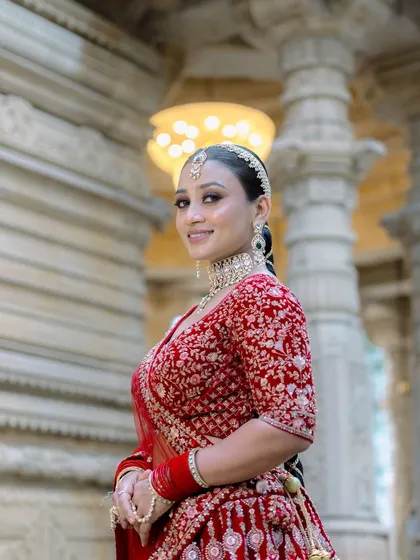 The complete bridal look. From the perfectly placed matha patti to the flawless skin, every detail is considered to create a cohesive and breathtaking result.