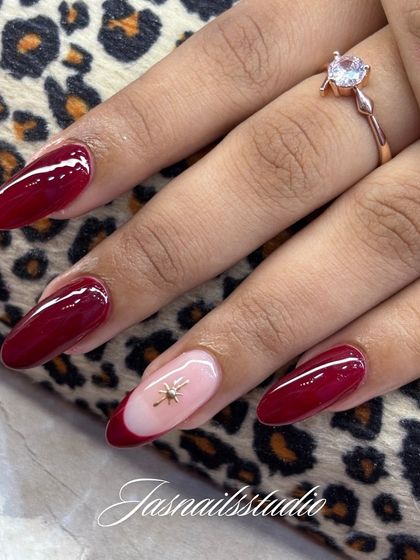 This festive red set looks so beautiful against the client's skin tone. The almond shape is very flattering.