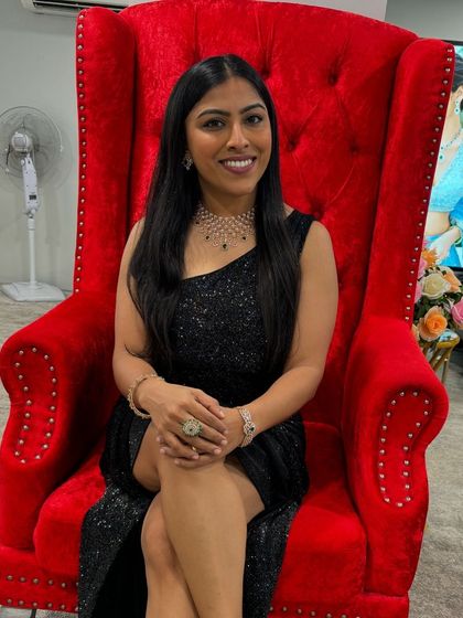 Taking my seat on the throne. This photo captures the queen-like confidence and command I bring when I host an event.