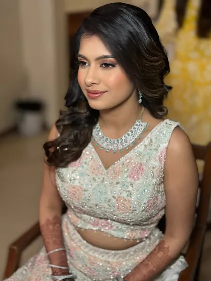 Glowing skin is always in. This reception look is all about creating a luminous, healthy-looking complexion that looks stunning in photos.