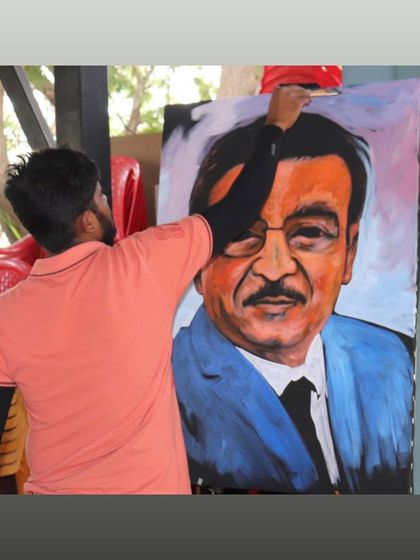 Another shot of me deeply focused while working on a live corporate portrait painting.