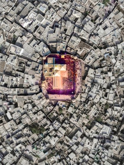 Another creative edit of the aerial Holi photo, with a desaturated and textured look that gives the vibrant celebration a timeless, artistic feel.