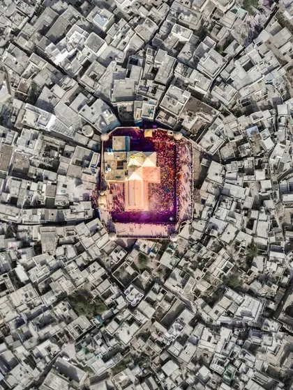 Another creative edit of the aerial Holi photo, with a desaturated and textured look that gives the vibrant celebration a timeless, artistic feel.