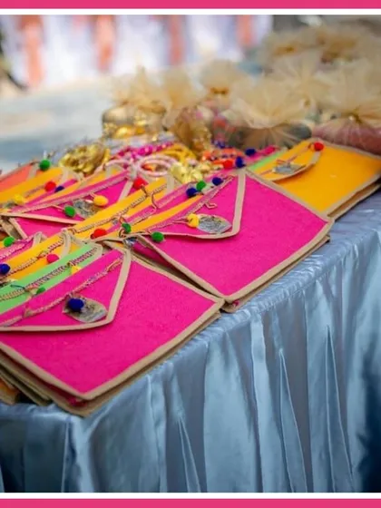 As part of the Rajasthani Mela theme, we arranged for these beautiful, colourful envelopes and potlis as wedding favors for the guests.