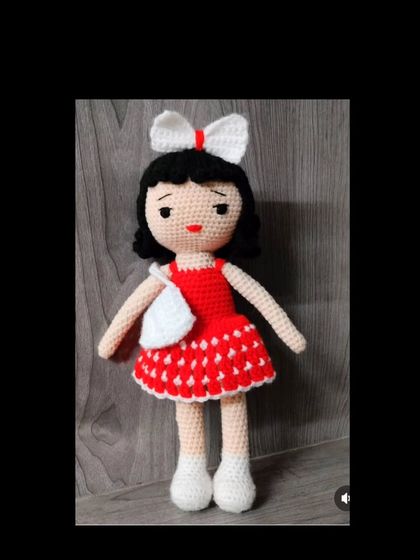 Another pretty doll in a red and white dress with a big white bow in her hair. I love the classic look of this color combination.