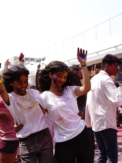 The pure joy of a Holi party. Two girls covered in color, dancing and having the time of their lives during my set.